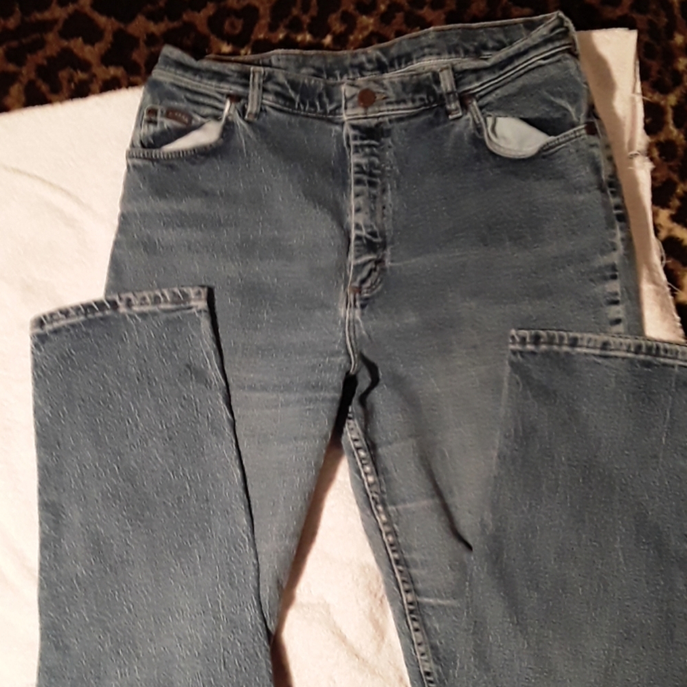 Straight leg jeans. Small stains on booty.